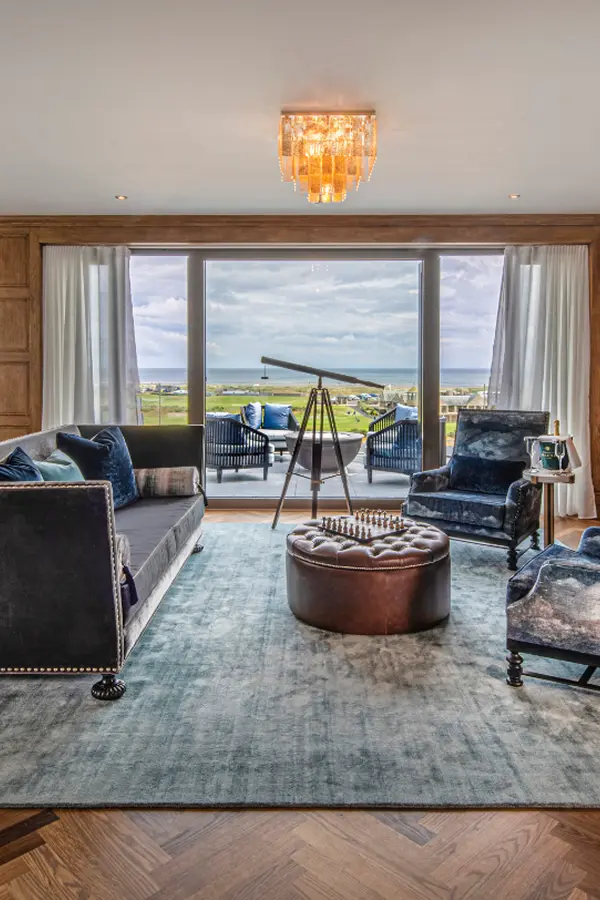 Lounge with ocean view and blue velvet sofas